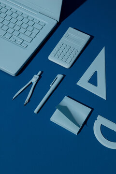 Still life of technical drawing objects in blue tones