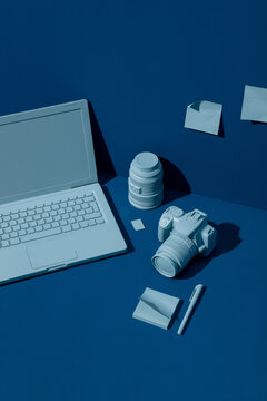 top view of a photographer desk in blue tones.
