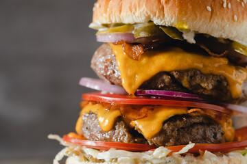 Close-up of Mouth-Watering Burger On Wooden Board.