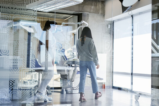 Woman having appointment in stomatologist 