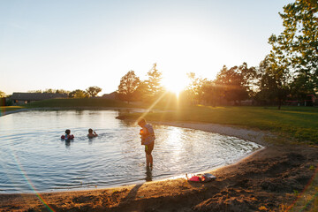 Sunset over a pond on a summer evening. 