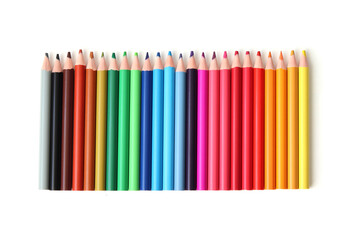 Obraz premium colour pencils in a row on a white background