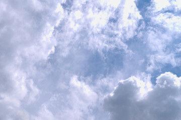 Fluffy white clouds on a blue sky