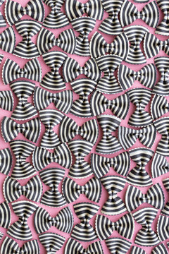 Black and white striped pasta bow background