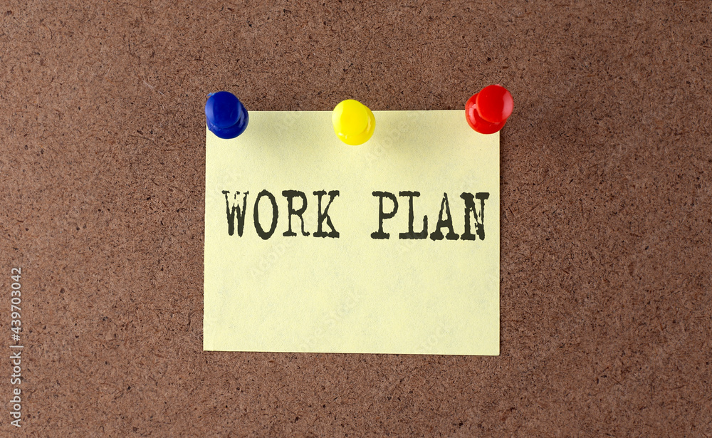 Poster work plan text written on the message board. memo