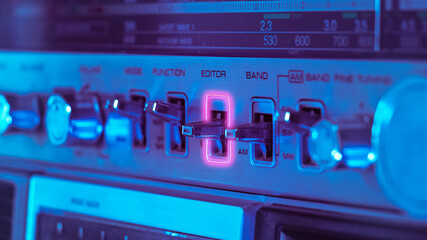 Turn the volume loud and enjoy to the music in this old-fashioned stereo equipment from the 80's edited with a neon cyberpunk style. 