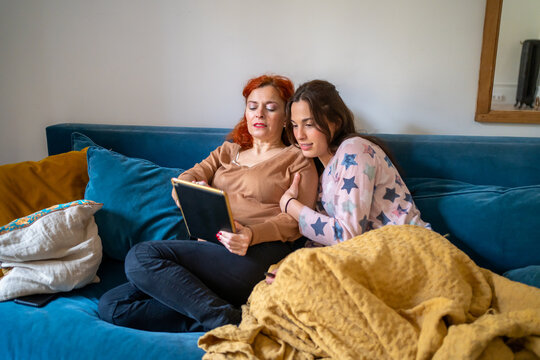 Mom And Daughter At Home. 