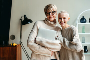 Female colleagues of different ages in a modern office.