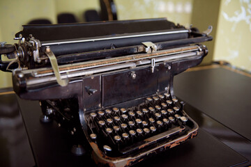 Antique Typewriter. Vintage Typewriter Machine Closeup Photo.