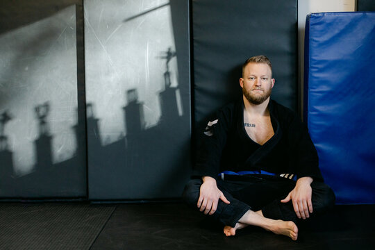 Judo Fighter Sits at Gym