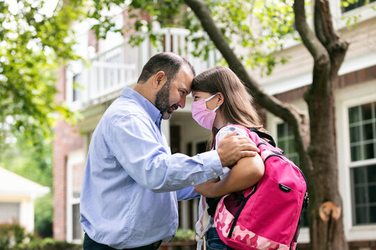 Student: Father And Daughter Share Moment Before School