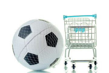 Classic soccer or football ball and shopping cart. Selling and buying sport equipment concept. White background. Sport supply chain industry