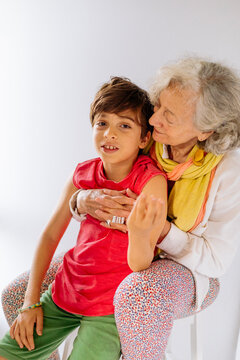 Portrait of colorful grandmother and grandson