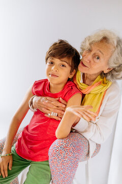 Portrait of colorful grandmother and grandson