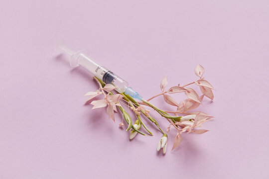 Syringe and flowers
