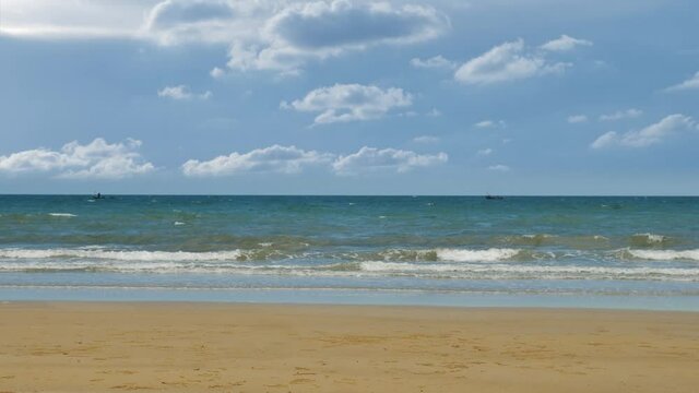 4k footage ; Rayong beach in the morning. view of sea beach with golden sand and bright blue sky in summer. Mah Pim Beach, Rayong, Thailand. On June 2021