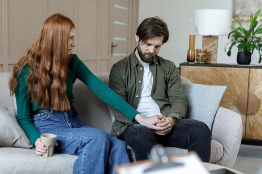 Man with depression receiving care from his wife 