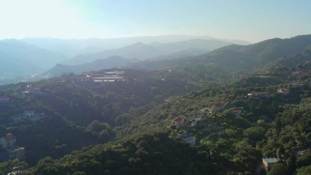 Aerial view of landscape in Garbasso, Celle Ligure comune, Savona province, regione Liguria region. Ligurian coastline with green hills. Drone 4k footage