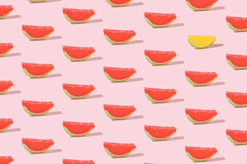 Lemon and watermelon jelly candies with sugar crumbs. Minimal pattern on a pink background.