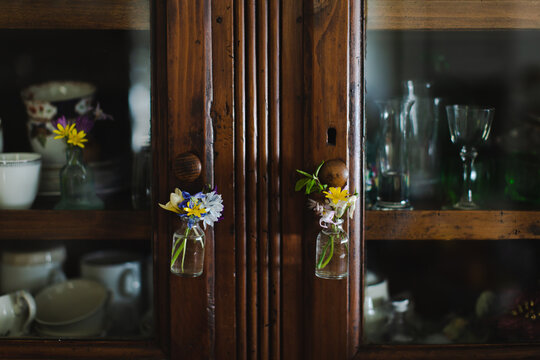 Flowers in hanging jars 