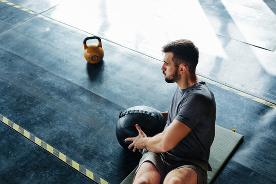 Man Exercising in Gym
