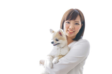 犬を抱く女性・ブリーダー