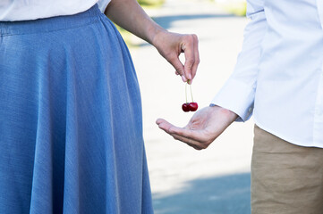 Hands of man and woman holding together. Couple in love. Sensual. Hand. Photo. Nature background. 
