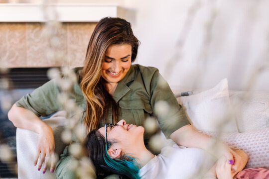 Brunete mother looking at her teen daughter