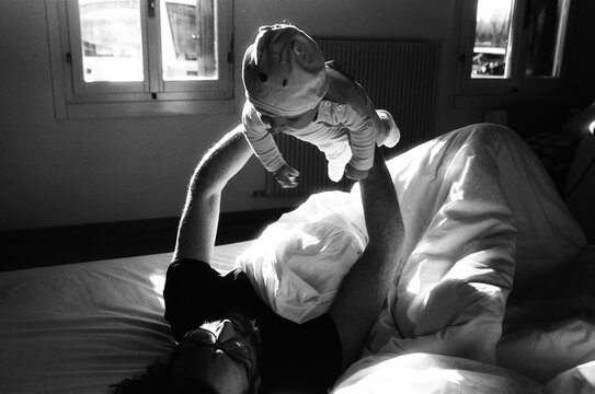 A beautiful family in a bedroom