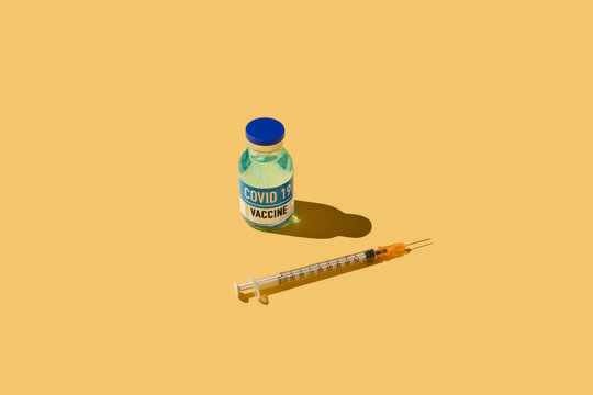 covid-19 vaccine and syringe