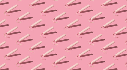 pattern of menstrual tampons in pink tones
