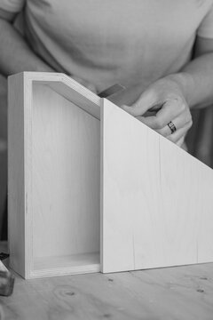 wood worker building custom shape