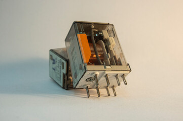 Electronic components: relays on light background