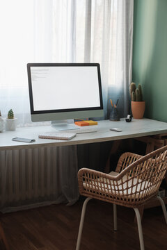 Desk And Empty Chair In The Home Office