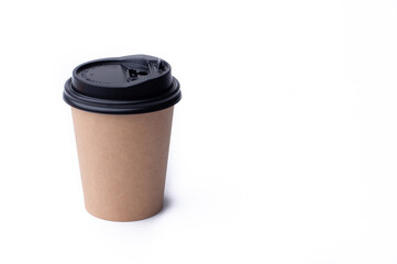 cardboard coffee cup with insulated plastic lid on a white background