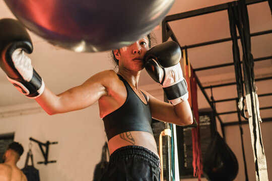 Athlete punching during a bag-work session