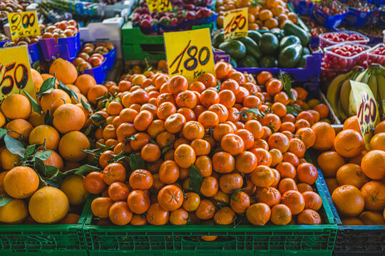 Orange Clementines at the Local Open Market - Powered by Adobe