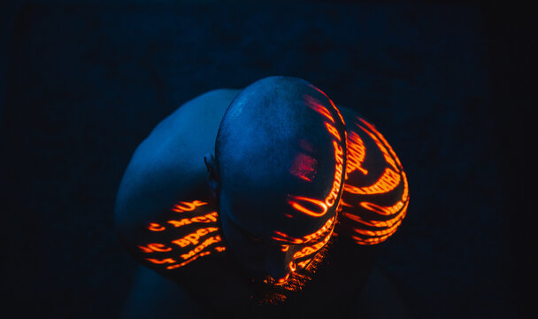 An excerpt in Cyrillic written on a human body