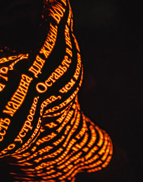 An excerpt in Cyrillic written on a human body