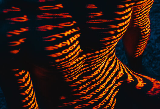 An excerpt in Cyrillic written on a human body