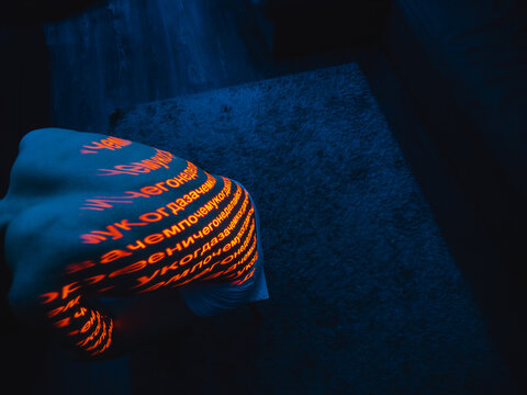 An excerpt in Cyrillic written on a human body