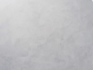 Abstract of  light gray cement wall in room.