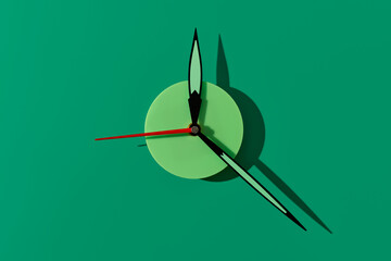 green clock, set at 12.20
