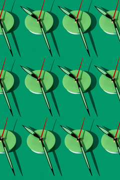 mosaic of green clocks at 11.30