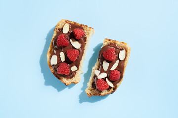 Toast with Hazelnut Spread, Raspberries and Almonds 