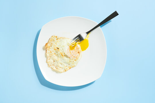Fried Egg on Plate with Fork 