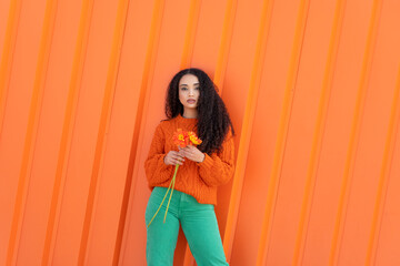 Beautiful Woman With Orange Blooming Flowers