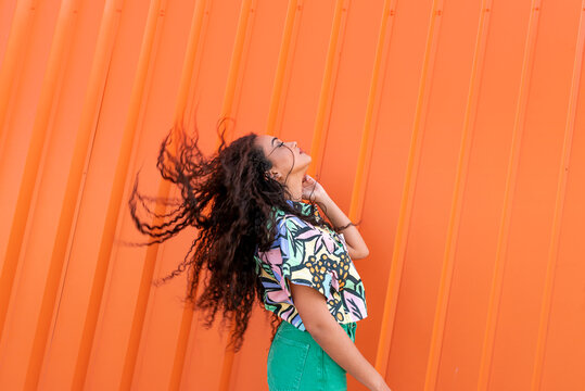Careless black woman in movement