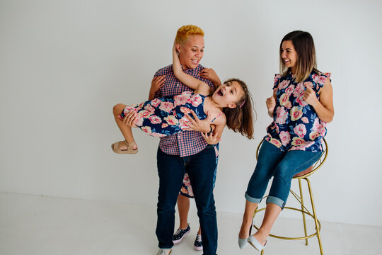Bonus mom holding happy daughter