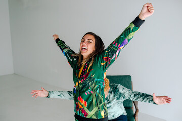 Happy woman with outstretched arms